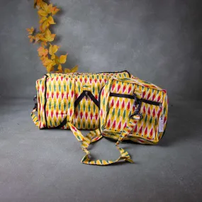 Expandable Travel Bag Yellow Colour with Red Green and White Zig Zag Design.