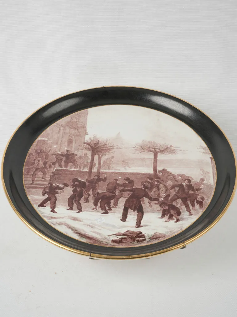 Large round porcelain plate w/ snowball fight scene - Signed E. Dessain 18"