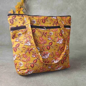 Medium Size Handbag Yellow Colour with Brown and orange Design Prints.