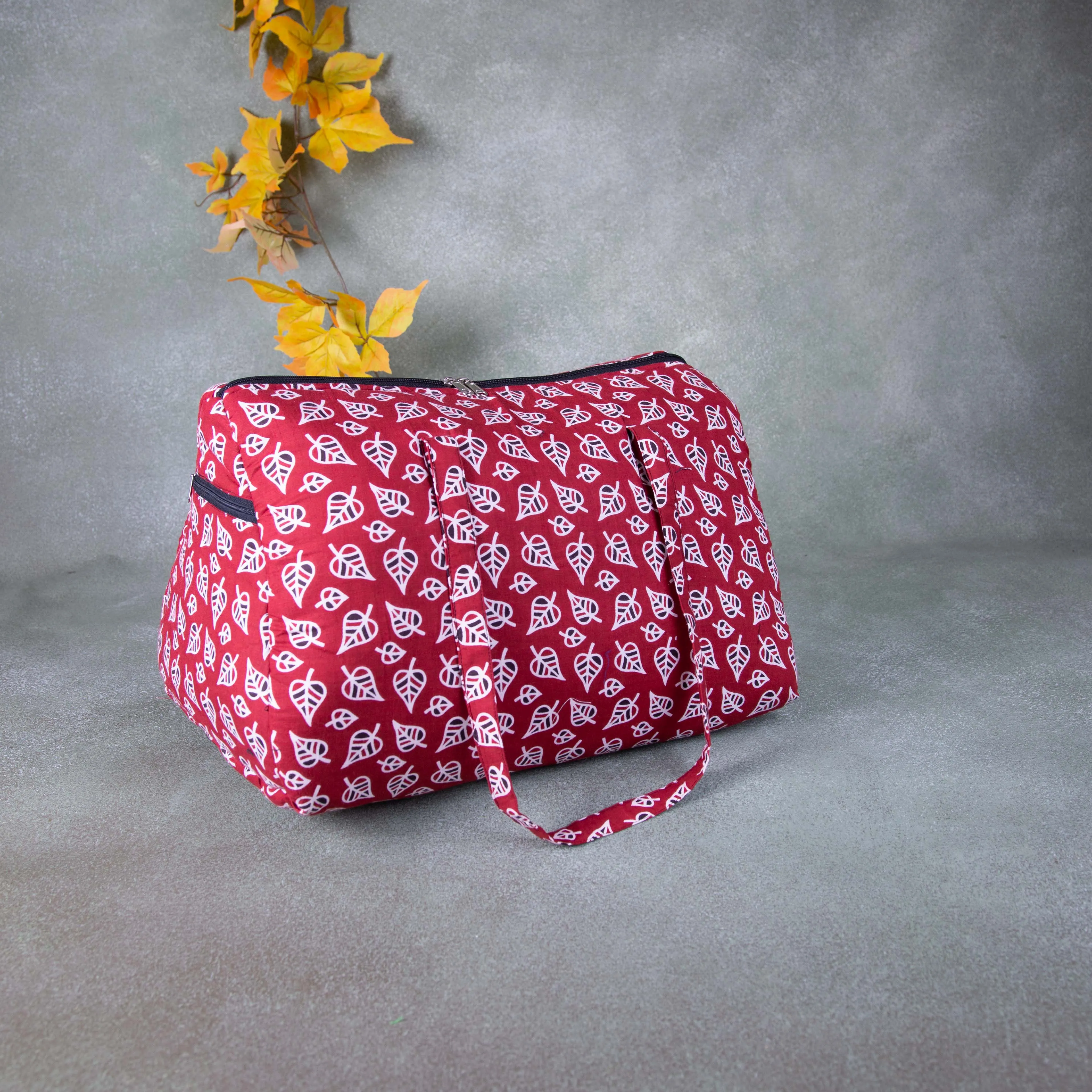 Weekender Travel Bag Red Colour with Leaf Design.